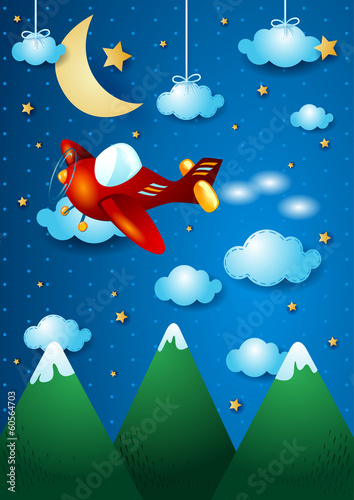 Airplane over the mountain, by night