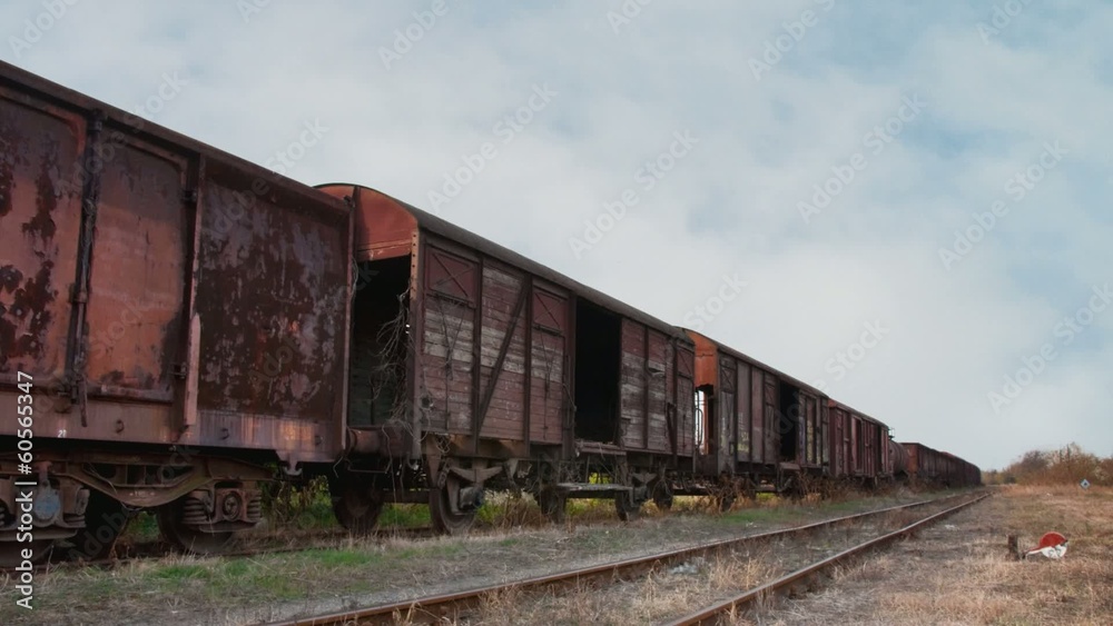 Old train with cargo containers in the station Old train with cargo containers in the station