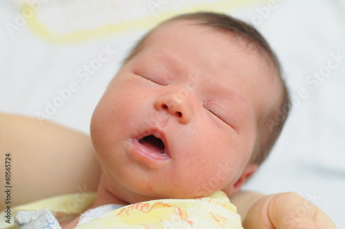 Baby sleeping with his mouth open