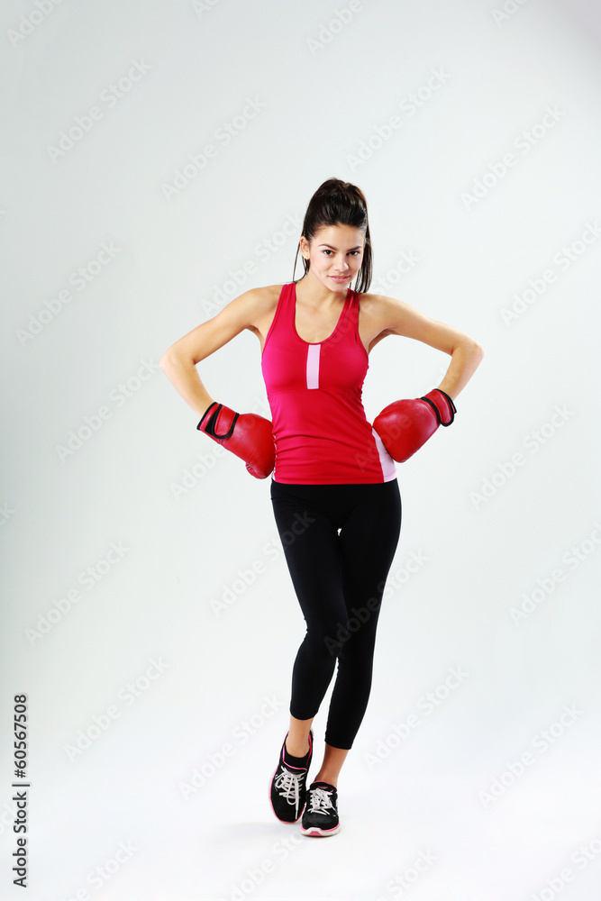 woman standing with boxing gloves woman standing with boxing gloves