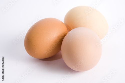 Three eggs on white ground