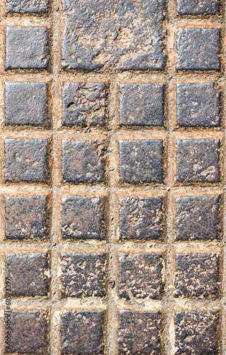 Textured background of man hole cover