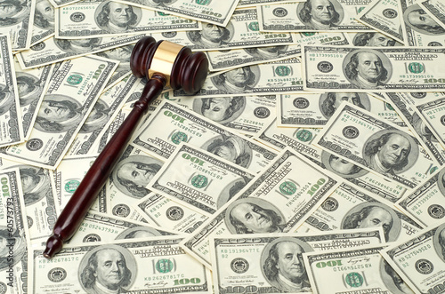 gavel on dollar background