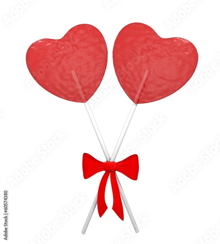 Two red heart lollipops