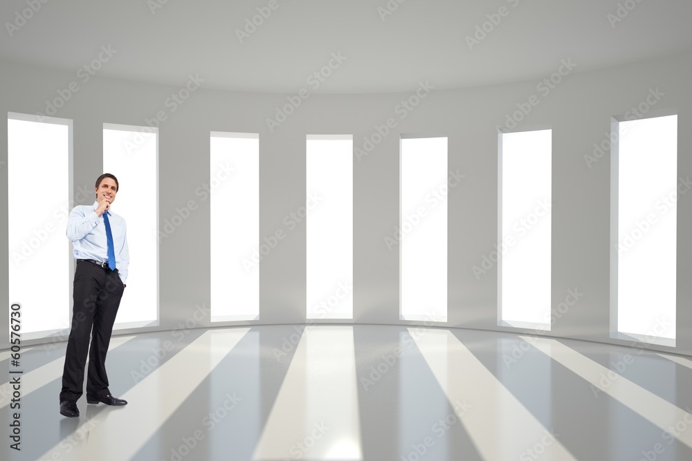 Composite image of thinking businessman touching chin Composite image of thinking businessman touching chin
