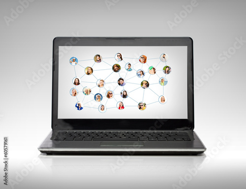 laptop computer with social network on screen