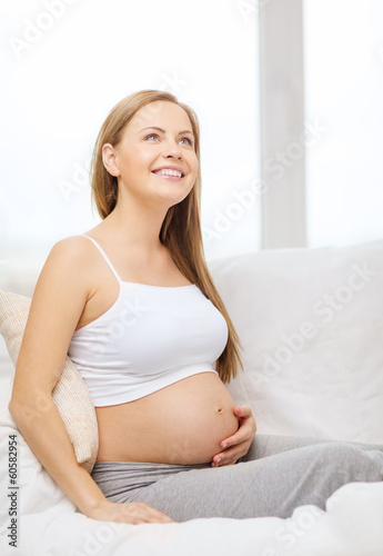 happy pregnant woman touching her belly Free Download happy pregnant woman touching her belly - GFXLoad