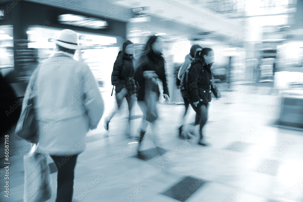 People silhouettes in shopping mal