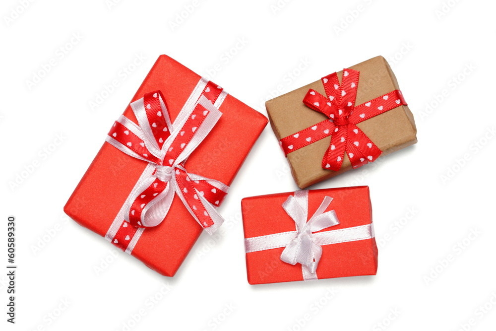 three gift boxes with ribbon bows, isolated on white three gift boxes with ribbon bows, isolated on white
