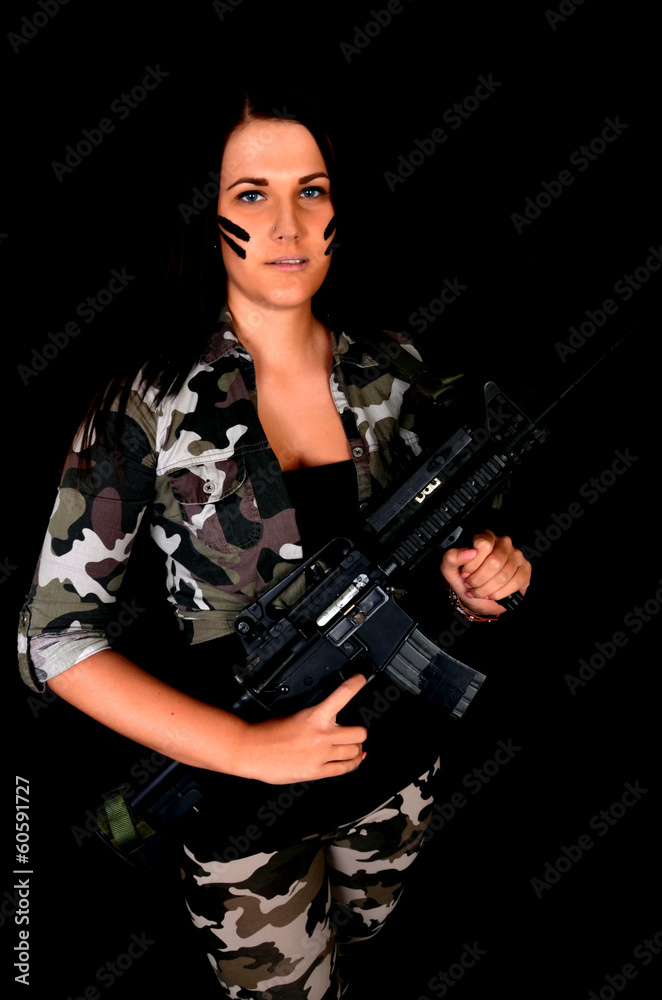 beautiful sexy girl holding gun