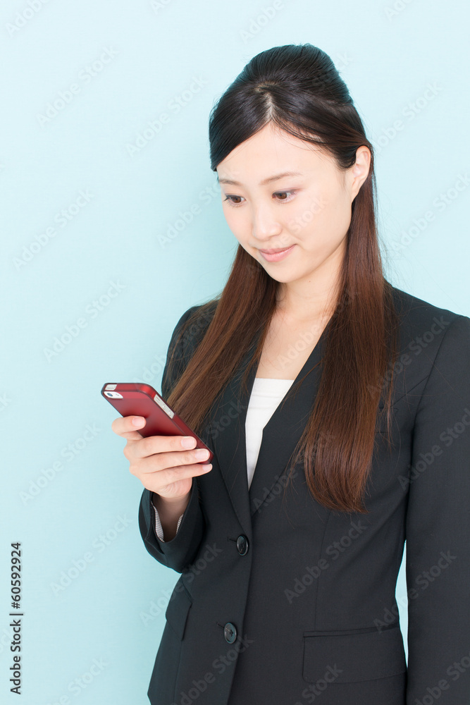 young asian businesswoman using smart phone young asian businesswoman using smart phone