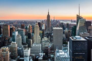 Fototapete Nordamerika Skyline von New York bei Sonnenuntergang  © mandritoiu