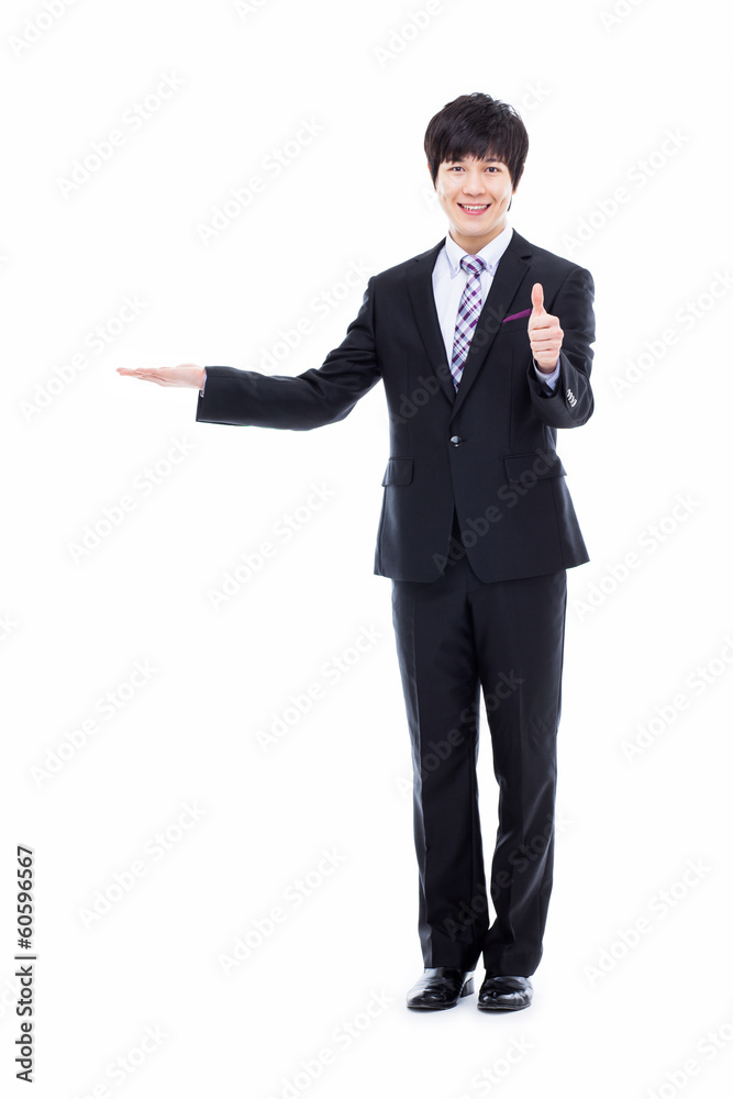 Young Asian business man showing something Young Asian business man showing something