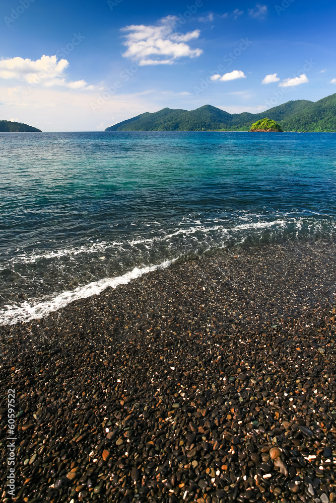 Beautiful sea and black pebble beach at tropical island, Koh Lip