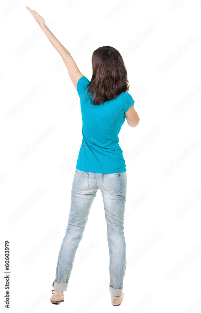 Back view of pointing woman. Back view of pointing woman.