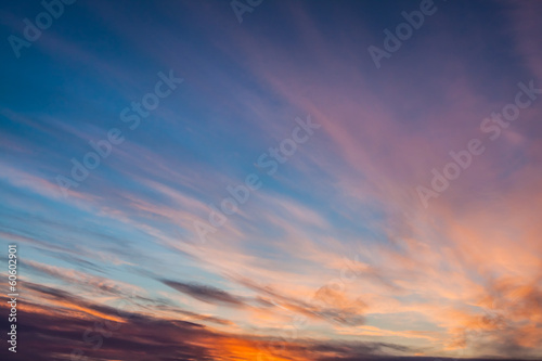 Fototapeta Naklejka Na Ścianę i Meble -  Dramatic sunset sky with orange colored clouds.