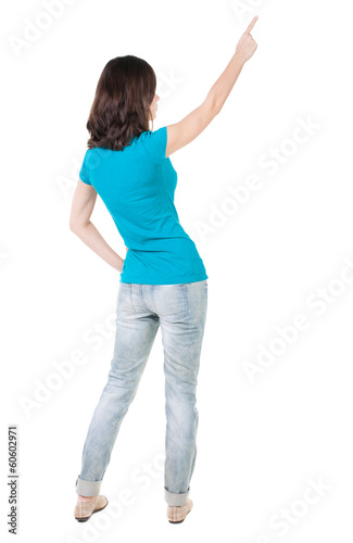 Back view of  pointing woman. © ghoststone
