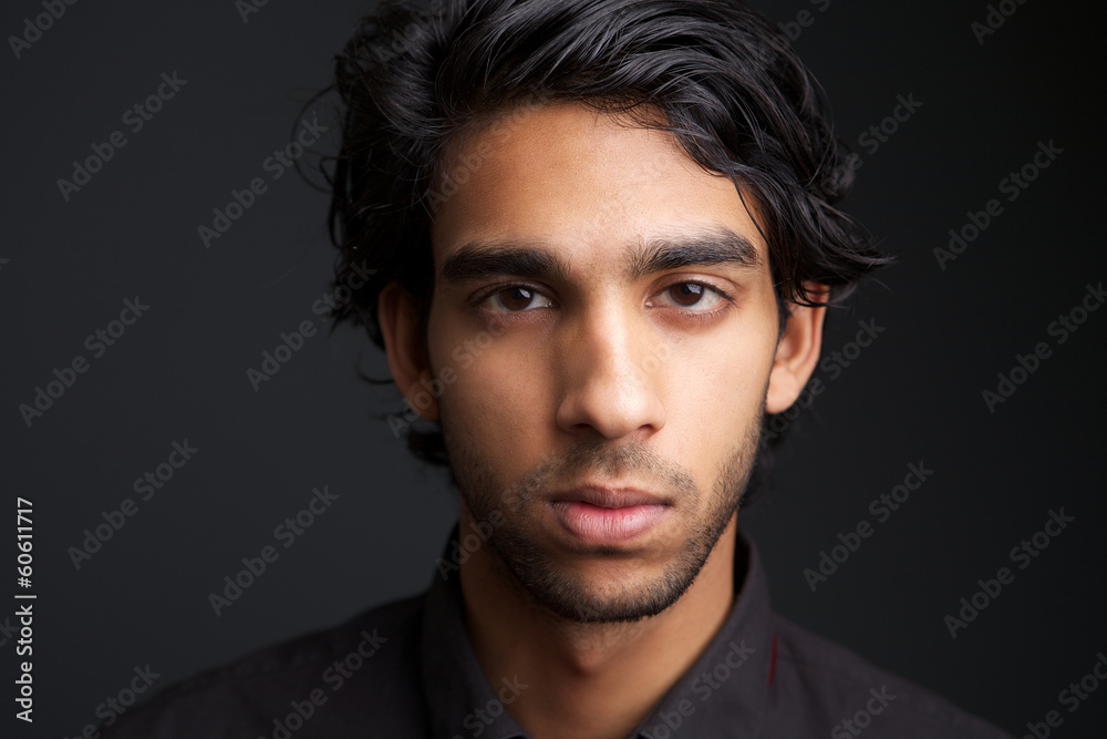 Man posing against gray background Man posing against gray background