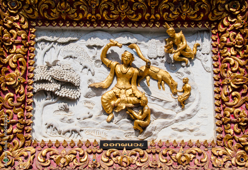 Ancient golden carving wooden window of Thai temple. Thailand