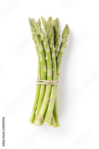 uncooked green asparagus tied with twine from above