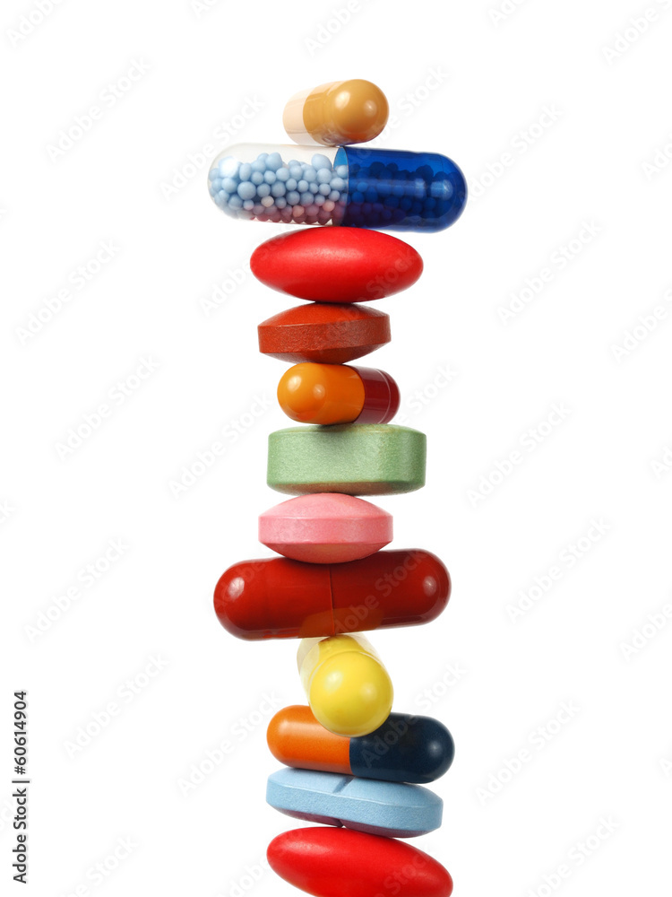 Stack of pills and capsules - obrazy, fototapety, plakaty 