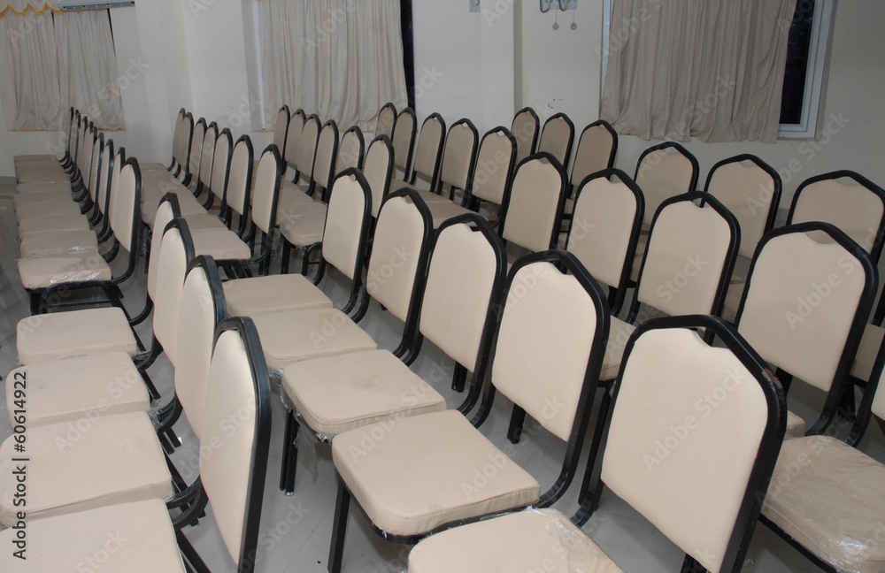 Fototapeta premium row of chairs in a hall