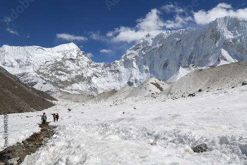 trekker beside of everest basecamp from everest trek nepal