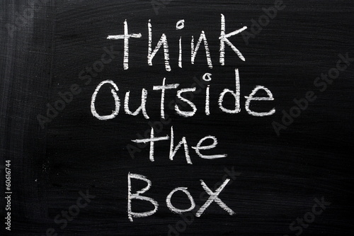 Fototapeta Naklejka Na Ścianę i Meble -  Think Outside the Box on a Blackboard