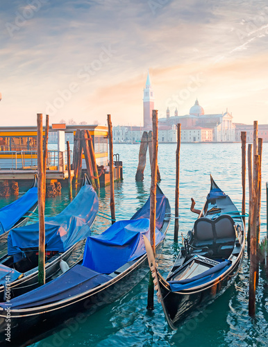 blue gondolas in Venice shore