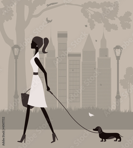 Woman walking with a dog