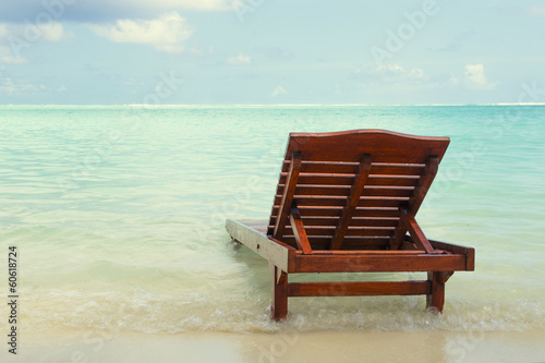 chaise lounge in the water