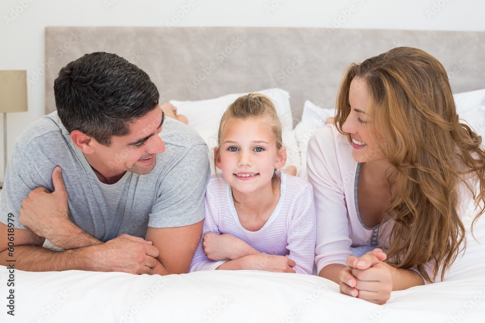 Girl with parents in bed Girl with parents in bed