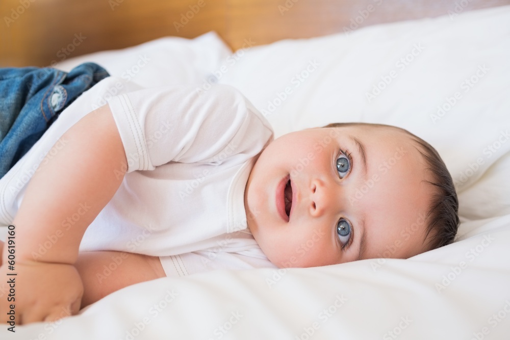Baby lying in bed Baby lying in bed