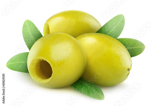 Isolated olives. Three pitted green olive fruits with leaves isolated on white background