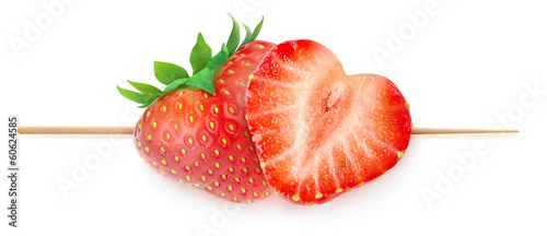 Two heart-shaped strawberries  on a skewer isolated on white (Valentine's day concept)