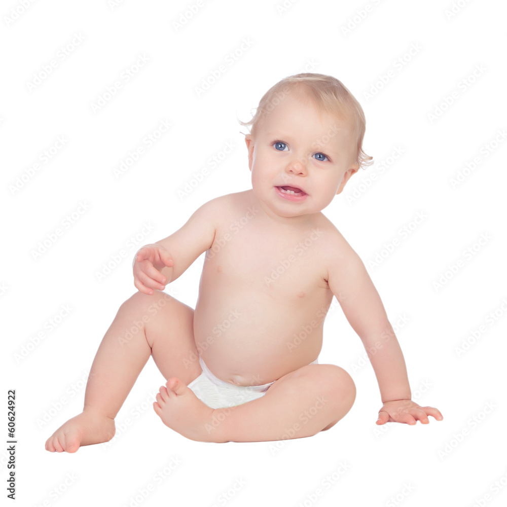 Adorable blond baby in diaper sitting on the floor Adorable blond baby in diaper sitting on the floor