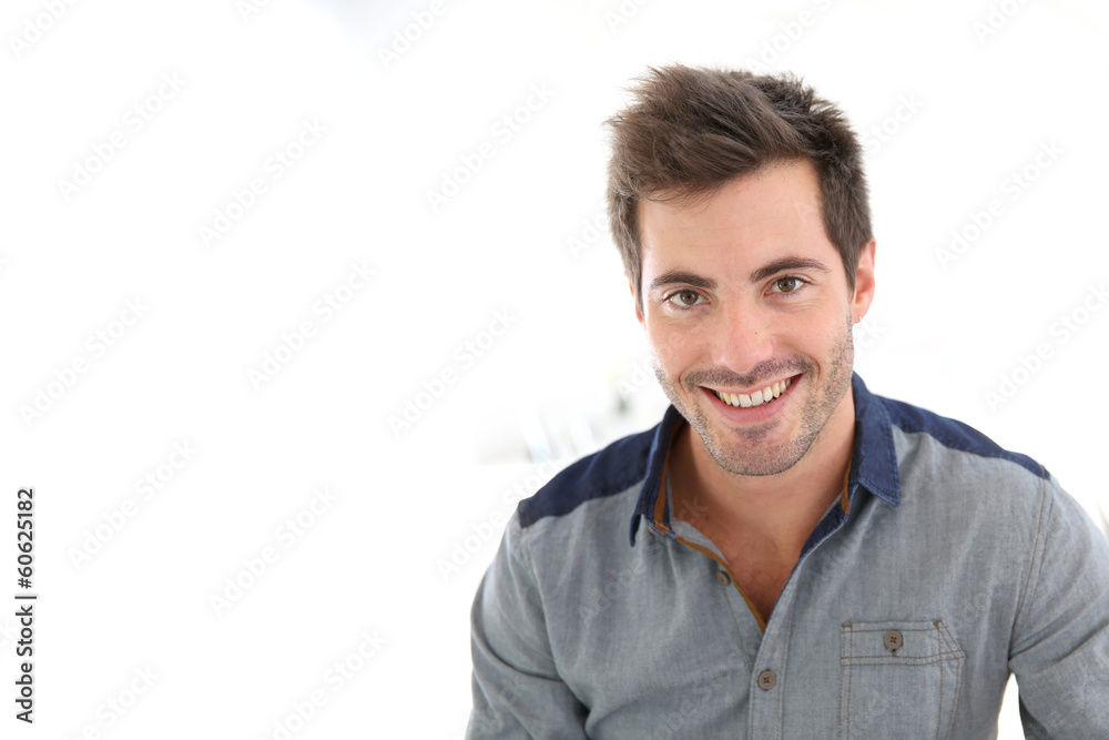 Smiling handsome man looking at camera Smiling handsome man looking at camera