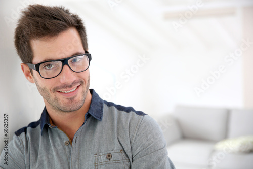 Cheerful handsome man with eyeglasses