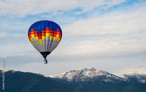 Multicolored Balloon in the blue sky © Deyan Georgiev