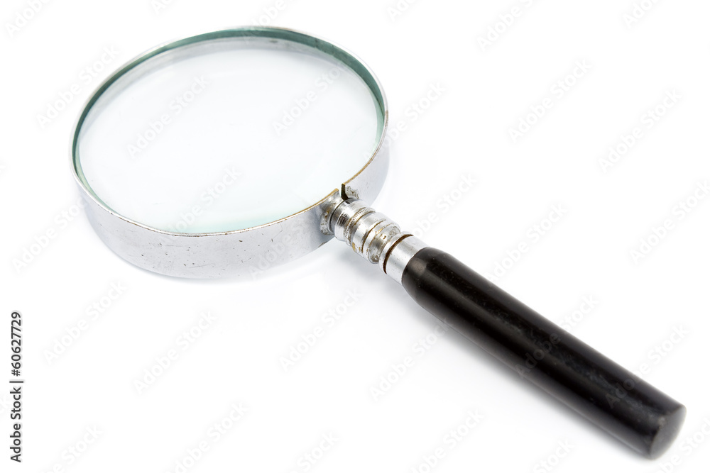 Antique magnifying glass isolated on white Antique magnifying glass isolated on white