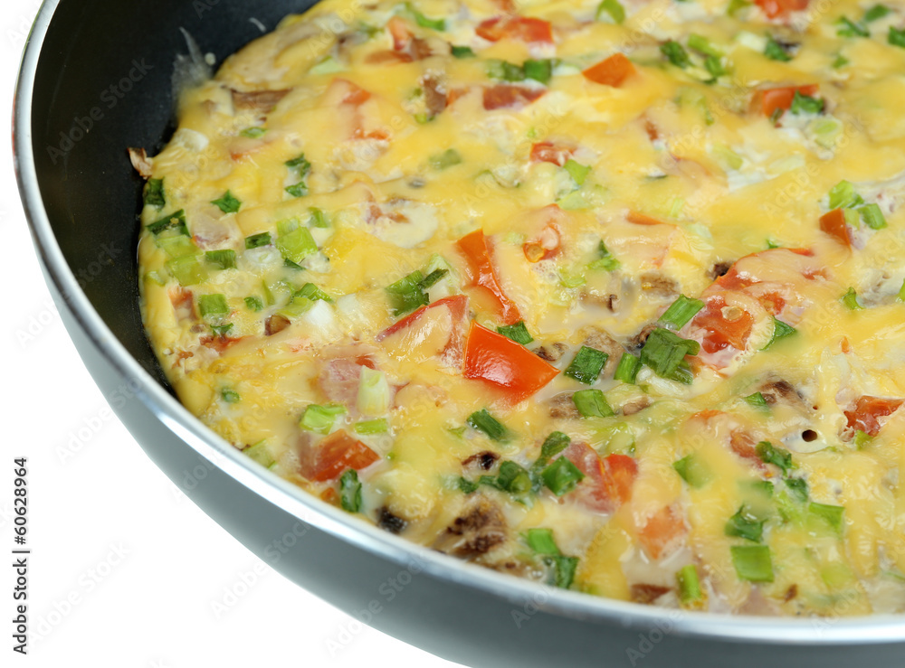 Omelet with vegetables close up