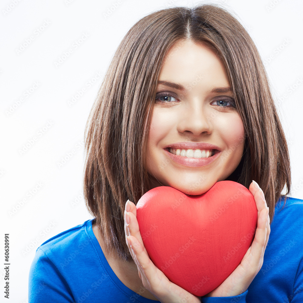 Smiling young woman hold red heart, Valentine day symbol. Girl Smiling young woman hold red heart, Valentine day symbol. Girl