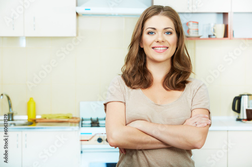 Woman in kitchen.