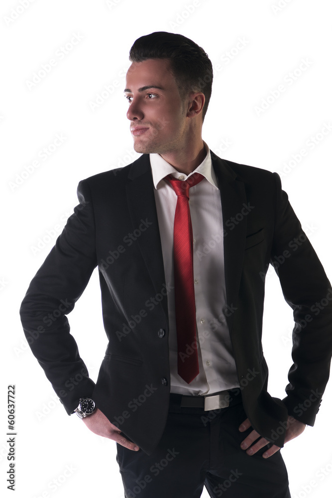 Attractive, serious young businessman with jacket and tie Attractive, serious young businessman with jacket and tie