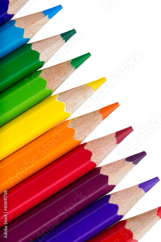 Row of colourful pencils isolated over white background