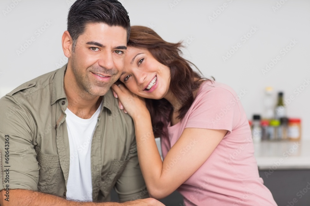 Portrait of a smiling couple in kitchen Portrait of a smiling couple in kitchen