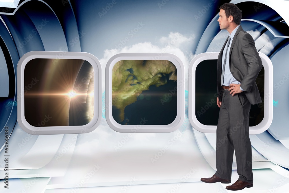 Composite image of serious businessman with hand on hip Composite image of serious businessman with hand on hip