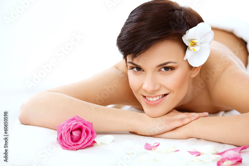 Beautiful Woman in Spa Salon Gets Relaxing Treatment.
