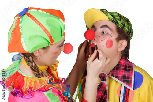 Couple of happy clowns isolated on white background