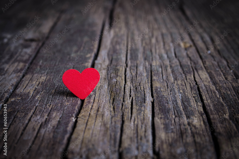 Fototapeta premium Red heart on wooden background